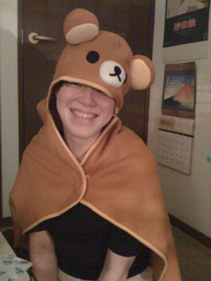 Hitomi's present for me: a Rilakkuma fleece. She looks better in it than I do.